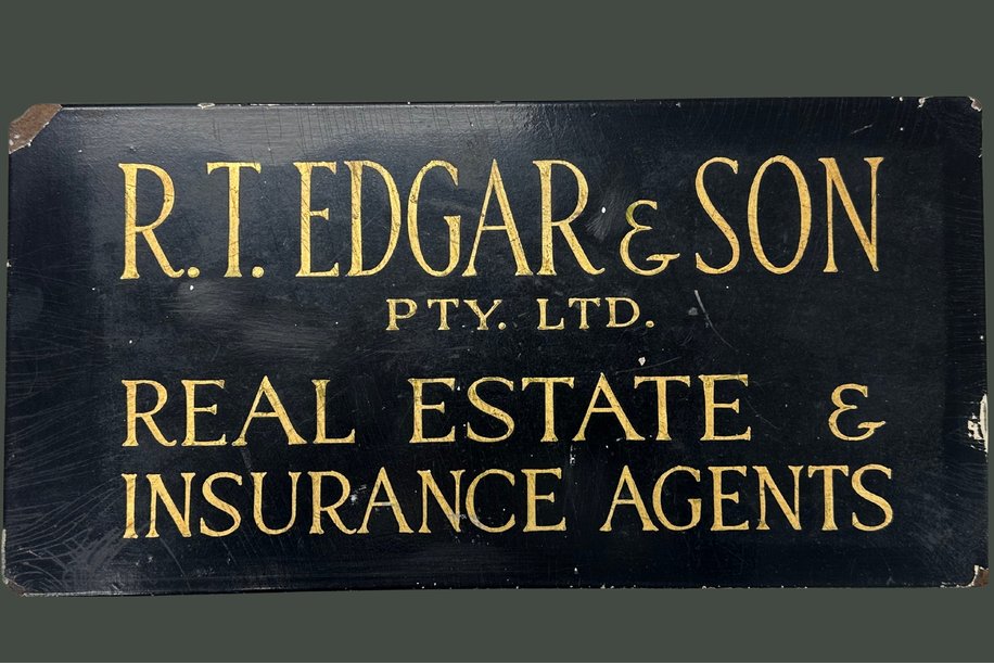 The original R.T. Edgar & Son sign, kept by Warwick Anderson in his office today
